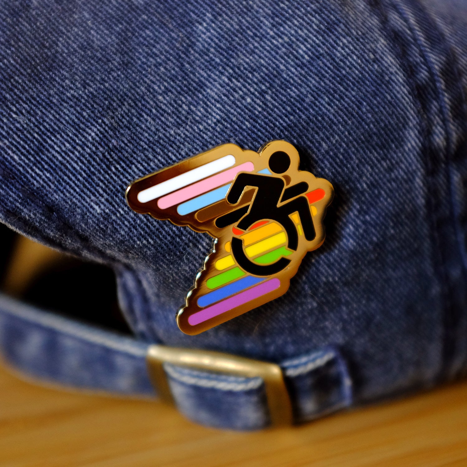 https://www.biancadesigns.co/cdn/shop/products/disability-pride-pin-by-bianca-designs-4.jpg?v=1569369796